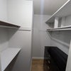 Photo 8: Spacious walking closet with extra storage 