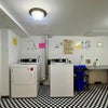 Photo 9: Basement laundry