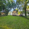 Photo 8: Rear View of House