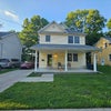 Photo 7: Front View of House