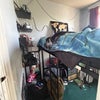 Photo 4: Queen size bunk bed; has done different things with the space below 