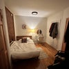 Photo 6: Your room with tons of closet space and exposed brick