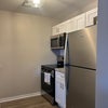 Photo 7: Kitchen with dishwasher 