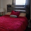 Photo 2: The bed is a queen size. 
