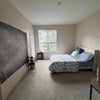 Photo 1: Large bedroom with balcony access! 