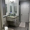 Photo 7: Spare bathroom that someone in an upstairs bedroom can use and have with a full bath and connected t