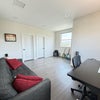 Photo 3: Room is currently used as a home office but the furnishings will be replaced by a full bedroom set (