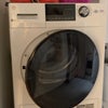 Photo 9: Washer Dryer (In Kitchen) 