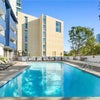 Photo 8: Pool and BBQ area