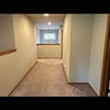 Photo 5: Bedroom is to the left of this hallway
