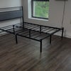 Photo 2: Bedroom with full bed frame