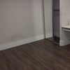 Photo 3: Mirrored closet and desk in room
