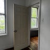 Photo 3: Door leading to large roo