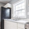 Photo 2: Stocked kitchen