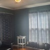 Photo 2: Bedroom with wallbed an unsued mattress