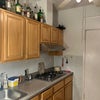 Photo 6: Kitchen. Microwave on the island