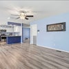 Photo 6: One of the living areas dining/tv room