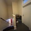 Photo 8: Unit entrance at the top of the stairs