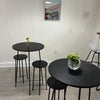 Photo 8: Tiny dinner table/stools. 