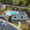 Photo 4: Main office with pool that our building is directly next to