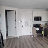 Photo 7: Living room/kitchen