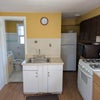 Photo 2: Shared kitchen and bathroom