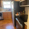 Photo 2: Kitchen with builtin dishwasher and microwave