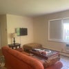 Photo 4: Living room with TV