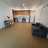 Photo 2: Shared living space 