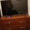 Photo 3: Deep dresser and Samsung TV