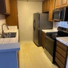Photo 9: Kitchen with updated microwave, stove, dishwasher