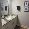 Photo 6: Designated Lavatory with storage 