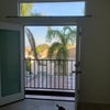 Photo 5: Room looking outside through the balcony 