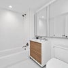 Photo 8: private bathroom with storage 