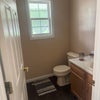 Photo 2: Downstairs bathroom. Another upstairs