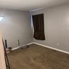 Photo 8: Empty room with closet. Junk to be removed. 