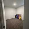 Photo 3: Empty bedroom- boxes for size reference, will be removed prior to move in. 