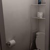 Photo 3: Toilet has swinging door