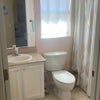 Photo 2: Shared full bath