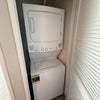 Photo 2: Washer and dryer in the unit