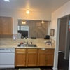 Photo 2: Kitchen and pass through