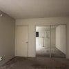 Photo 6: Mirrored Wall closet that opens on both sides in Bedroom
