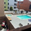 Photo 9: Pool, Jacuzzi, 3 Grills; Renovated courtyard