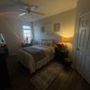 Photo 2: Very spacious room *does not come with decor*