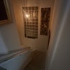 Photo 2: Stairwell to the downstairs 
