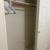 Photo 8: Extra closet space in a second empty bedroom if needed. 