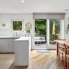 Photo 9: Kitchen and dining area