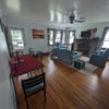 Photo 3: living/dining room furnished