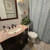 Photo 4: Bathroom with shower over tub