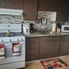 Photo 7: Full kitchen